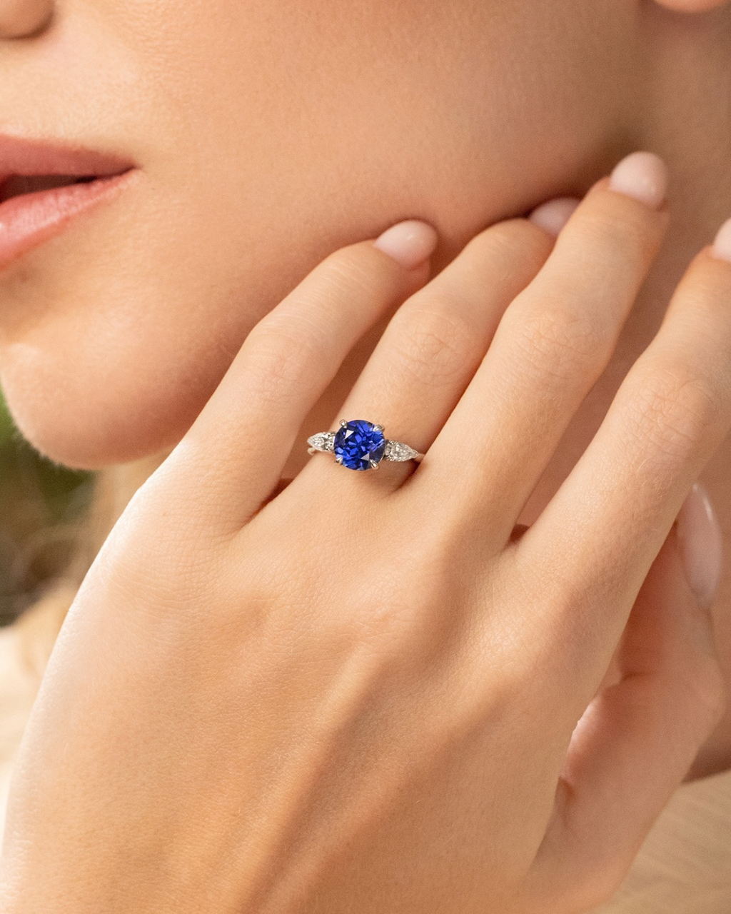 Blue Sapphire Round Cut Three Stone Engagement Ring in Sterling Silver