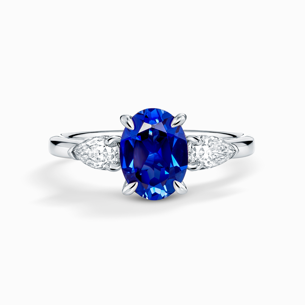 Blue Sapphire Oval Cut Three Stone Engagement Ring in Sterling Silver