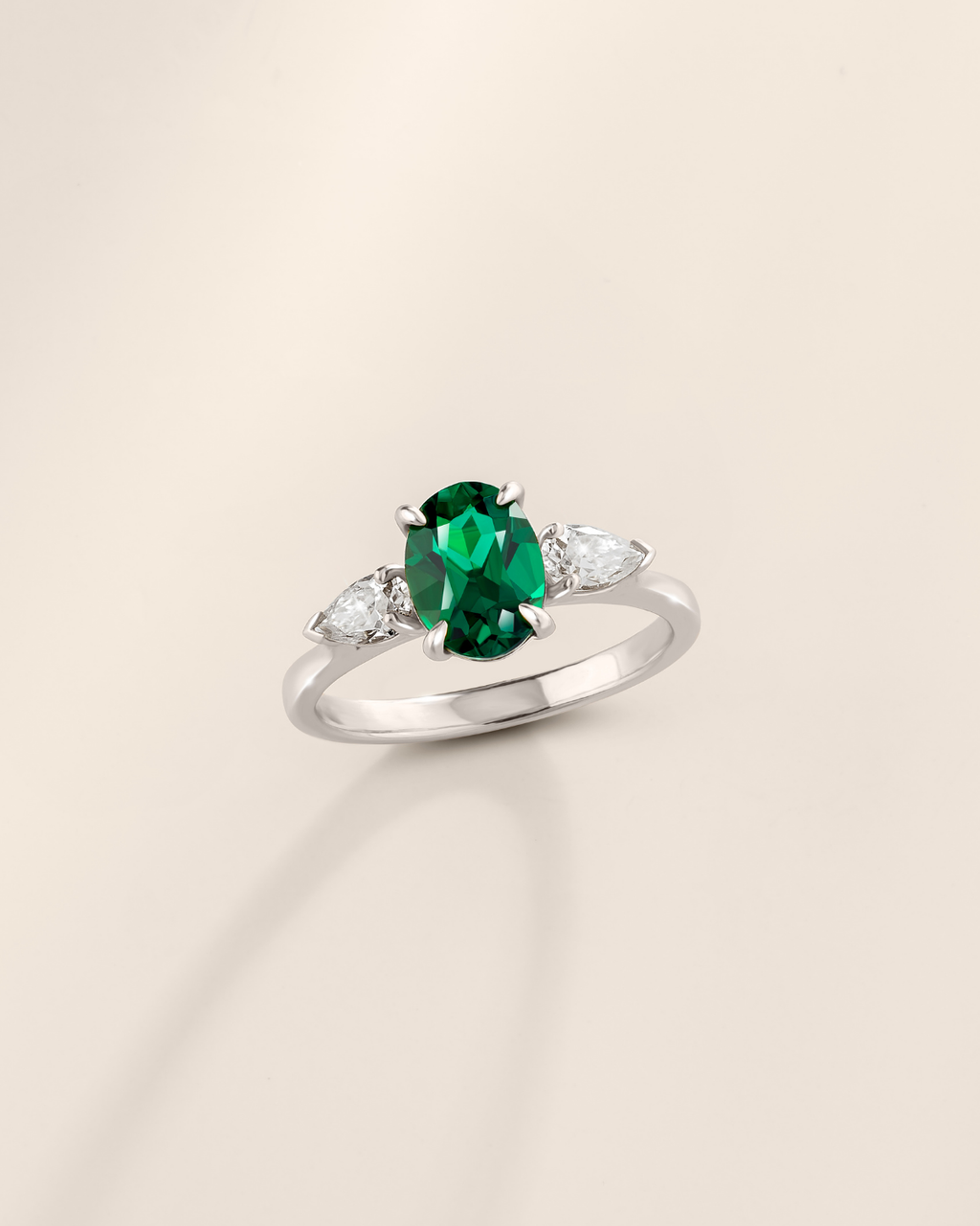 Emerald Oval Cut Three Stone Engagement Ring in Sterling Silver