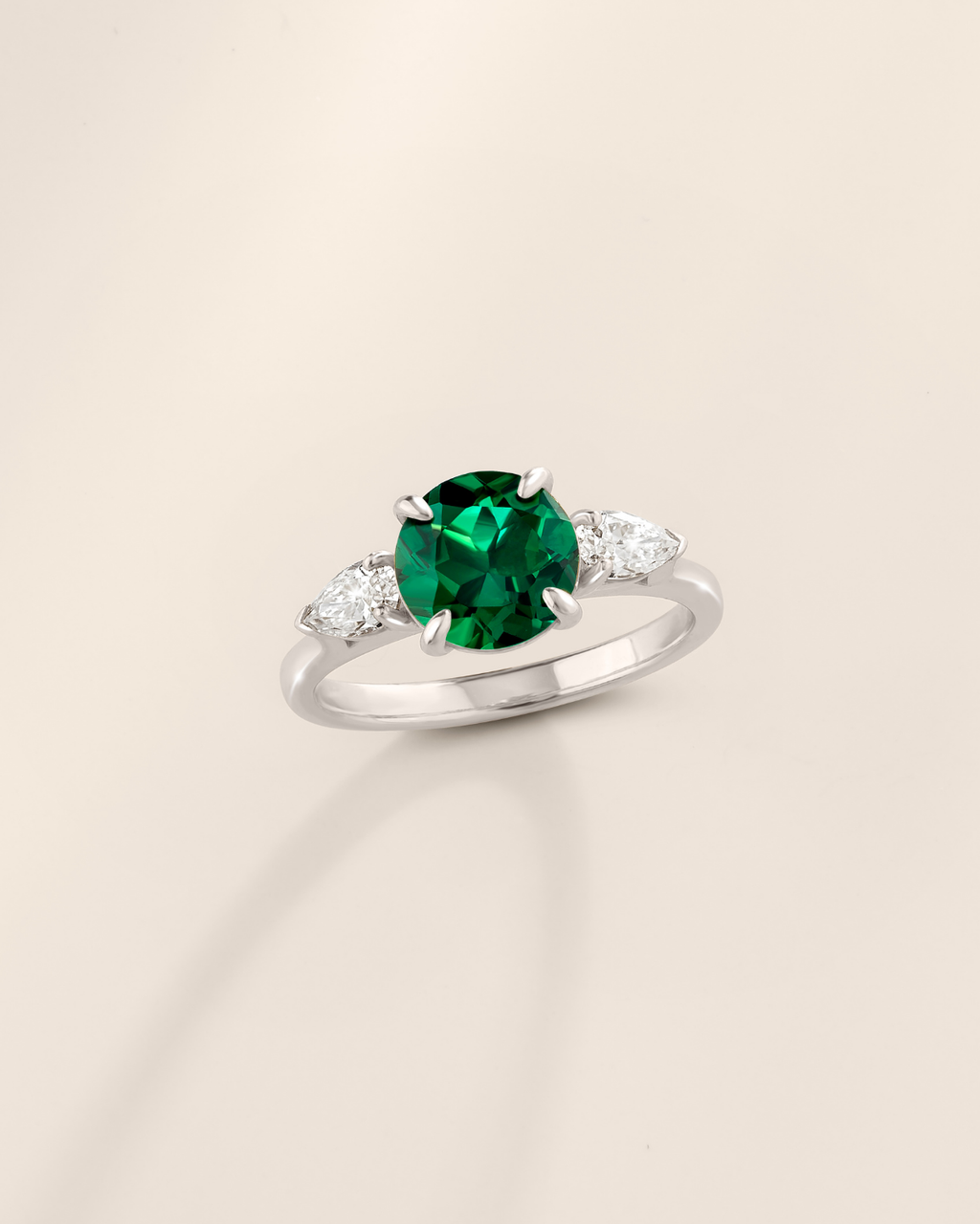 Emerald Round Cut Three Stone Engagement Ring in Sterling Silver