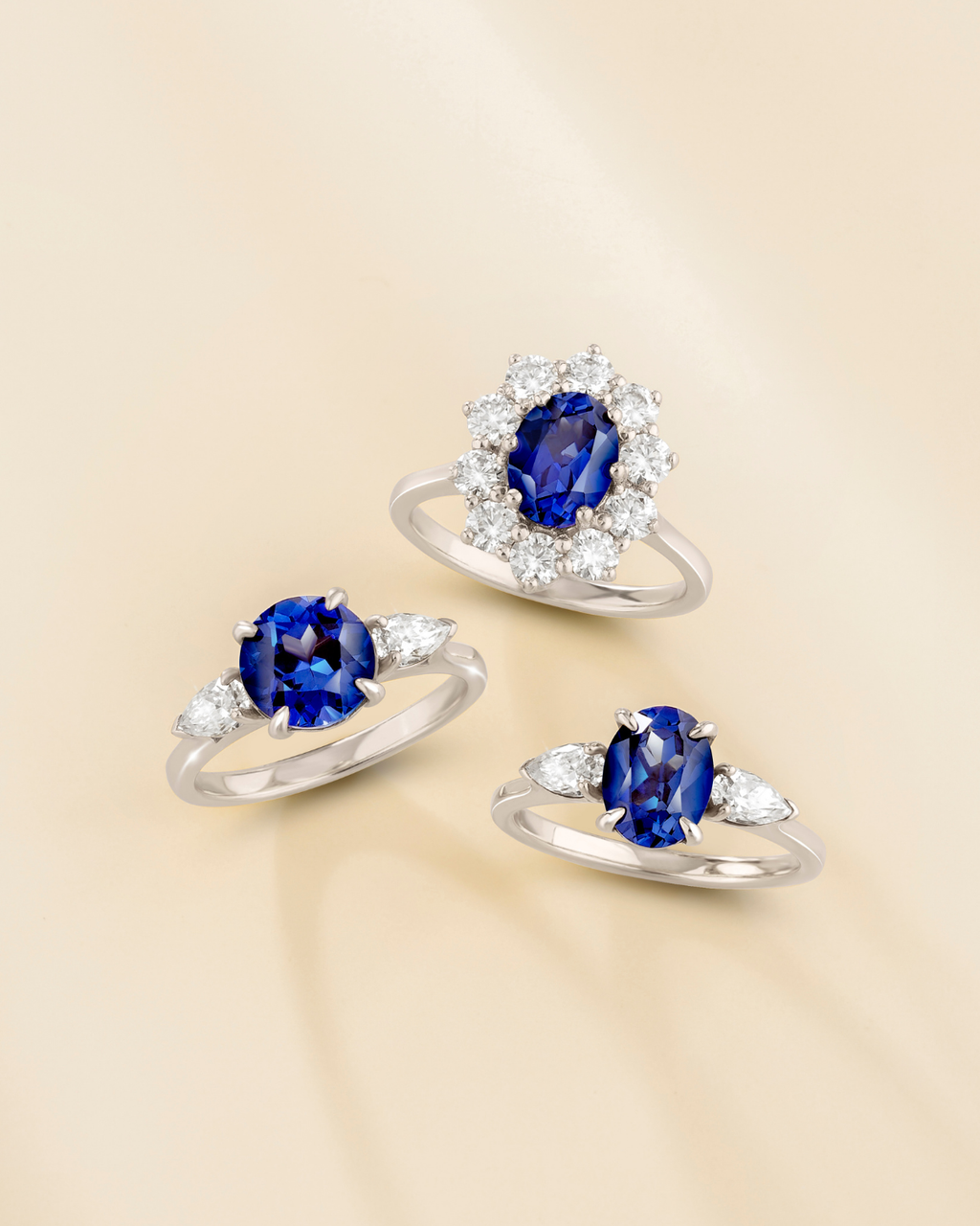 Blue Sapphire Round Cut Three Stone Engagement Ring in Sterling Silver