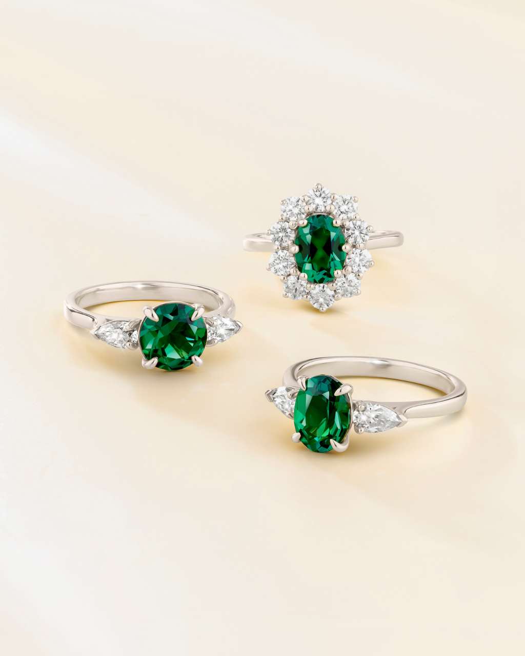 Emerald Round Cut Three Stone Engagement Ring in Sterling Silver