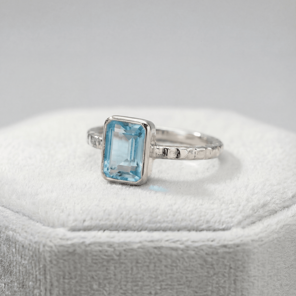 Tidewashed Sky Blue Topaz Ring – Octagonal Gemstone & Hammered Band
