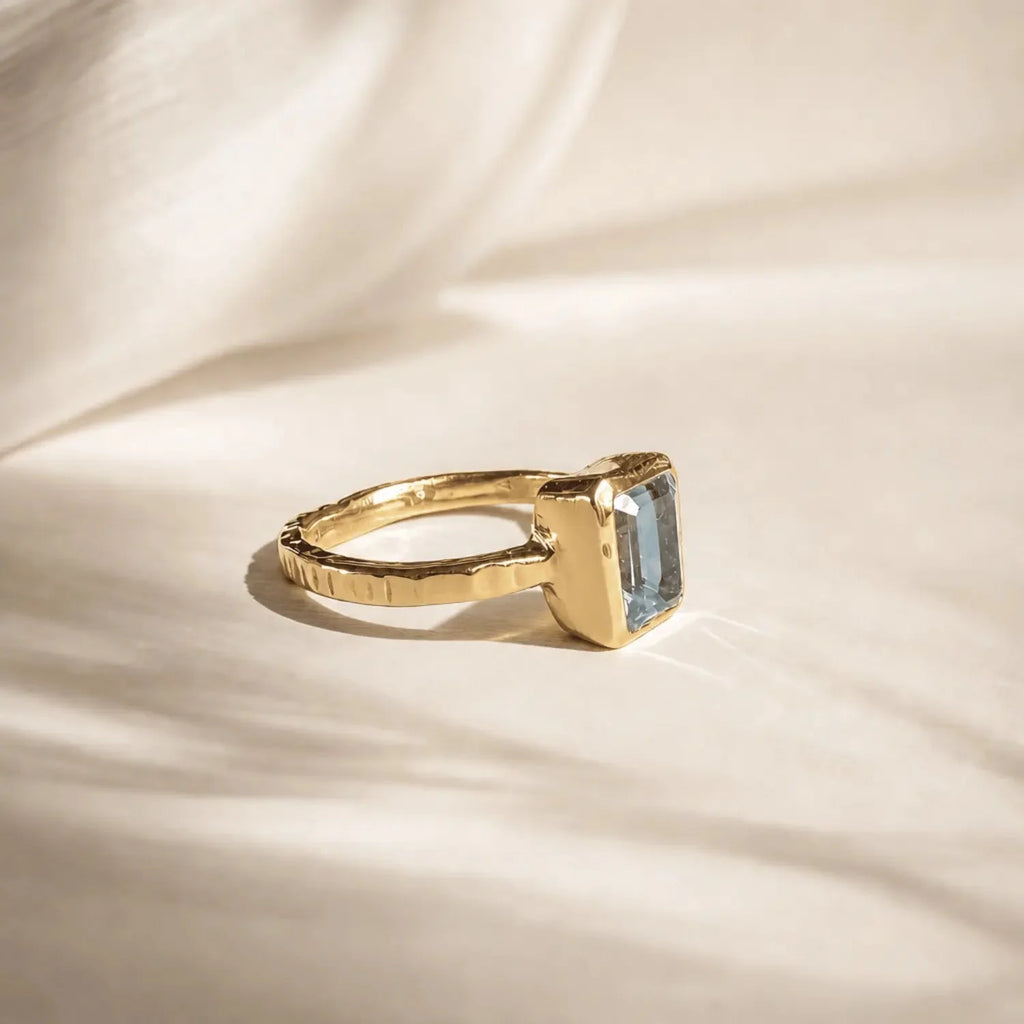 Tidewashed Sky Blue Topaz Ring – Octagonal Gemstone & Hammered Band